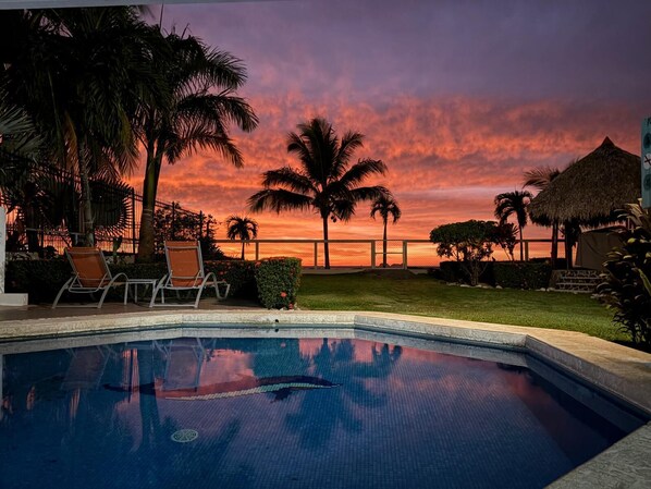 Oceanfront view....the ocean is RIGHT on the other side of the gate...