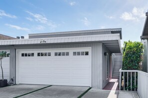 Apartment Exterior | Garage Game Room | Furnished Deck