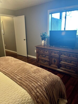 Queen Bedroom with Flatscreen TV.