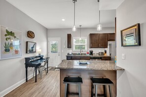 Dedicated Workspace and Additional Seating for Meals