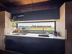 The kitchen highlights sprawling views, inspiring you to get creative in the kitchen.