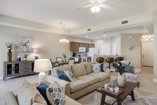 Large living room with ample seating and vaulted ceilings