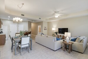 Large living room with ample seating and vaulted ceilings