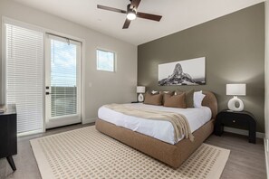 Primary Bedroom with King Bed and Patio Access