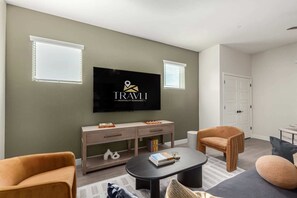 Large Living Room with 75" Smart TV and Plenty of Seating