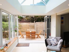 Outside-in dining with bi-folds open