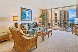 Tasteful Hawaiiana style decor in the ocean view living room