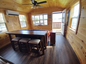 Kitchenette and living room have a fantastic view of the lake.