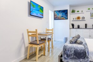 Spacious Private Studio with Queen Bed, Dining Table, Smart TV & Kitchenette