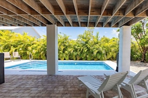Downstairs covered/shaded area with private pool