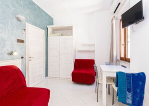 Sofabed and armchair-Casa Bartolomea 5-Elba Island