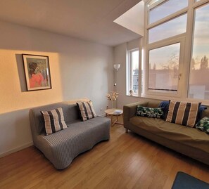 Cozy sitting area with stylish touches
A welcoming lounge perfect for reading, relaxing, or sharing a glass of wine.
