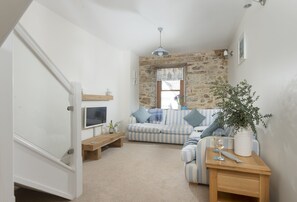 The Old Cornstore, St Agnes: The cosy sitting room provides the perfect spot to unwind