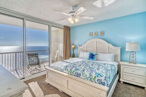 Gulf front master bedroom with a king size bed.