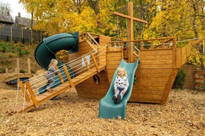 Let the little ones have a great time. We had a custom playground built!