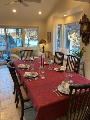 Dinner celebrations with a view and a fire burning in the fireplace.