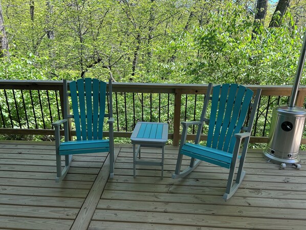 Enjoy the large deck overlooking the woods