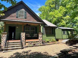 Newly painted exterior with new wire railing and new stone veneer and columns