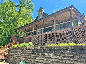 Updated wire railing on covered back porch for less obstructed views