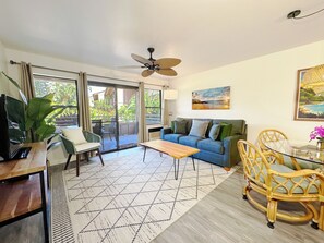 Tropical charm meets modern elegance in this inviting dining space.