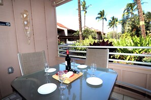Relax and take in stunning views from this spacious lanai, perfect for outdoor lounging.