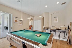 Game room with pool table & wet bar