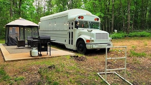 Plenty of outdoor space with ladder ball and a patio