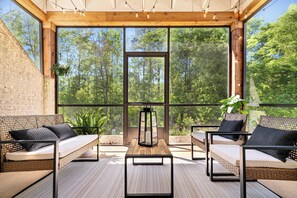 Our quiet, screened-in patio is the perfect place to enjoy a morning coffee/tea.