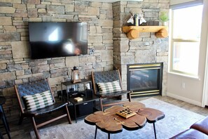 Smart TV and gas fireplace for time spent indoors.