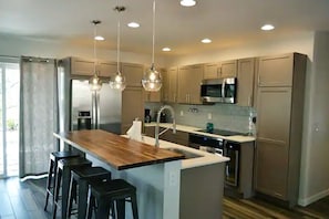 Well-stocked kitchen for home-cooked meals. 