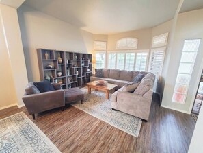 Our living room offers plenty of comfortable seating and stylish decor, creating a cozy and inviting atmosphere for relaxation and entertainment.






