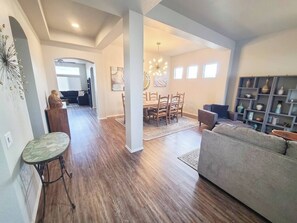 Step into our spacious living and dining areas as you enter our home. With abundant seating, it's the perfect space to gather with friends and family.
