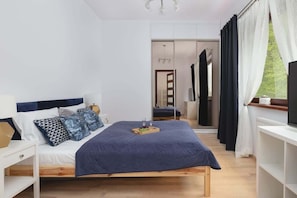 Bedroom with comfortable double bed.