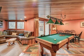 A game room for the entire family - pool, darts, puzzles, board games, DVDs and a big TV
