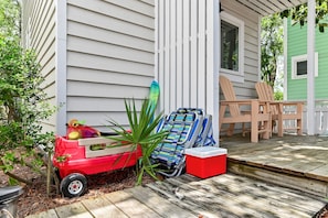 Wagon, chairs, an umbrella, and a cooler for you to enjoy the beach.