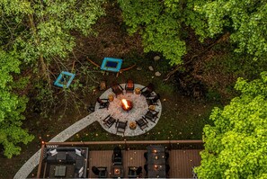 Gather around the fire pit under the stars in our serene outdoor seating area, surrounded by nature. A perfect place to relax and enjoy the peaceful Poconos evenings.