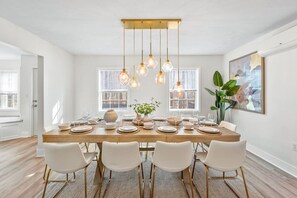 Enjoy family meals in our beautifully designed dining room with ample seating and modern, elegant lighting. Ideal for gatherings and memorable moments together.