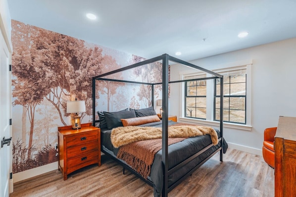 Comfort meets entertainment in our king bedroom