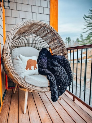 Relax in style with our cozy rattan chair