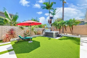 Sun loungers near the hot tub