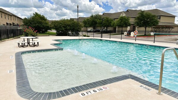 Sparkling community pool to relax with family and friends