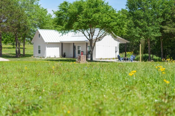 Side view of the home and the country side scenery.