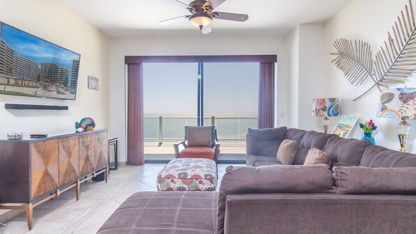 The wrap around sofa in the living room.