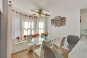 Dining Area | Main Level | Breakfast Bar | Ceiling Fans