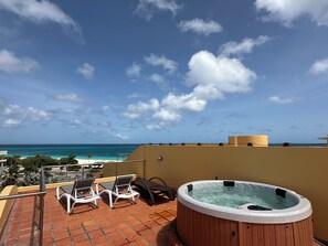 Hmmm, shall I lounge in the sun or soak while watching the sun set?