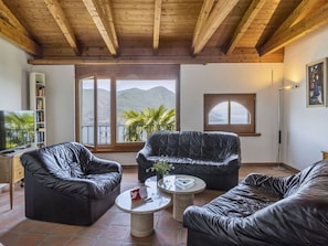 Furniture, Property, Couch, Plant, Comfort, Wood, Shade, Interior Design, Living Room, Building