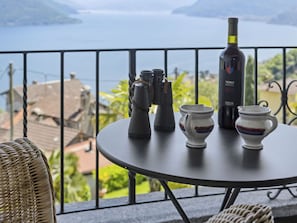 Water, Tableware, Property, Sky, Furniture, Drinkware, Table, Bottle, Barware, Wood