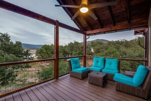 Step out onto the private covered patio off Bedroom 2, offering a tranquil outdoor space to relax and enjoy the surroundings. Perfect for morning coffee or unwinding in the evening, this cozy retreat adds extra charm to the bedroom.