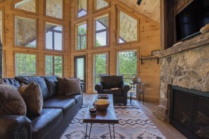 Vaulted ceilings and floor-to-ceiling windows.