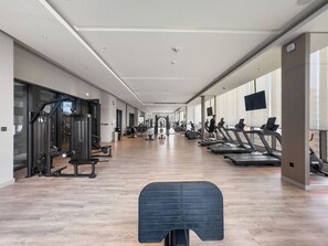 Fitness Center: Stay active with top-notch equipment and stunning city views while you work out!